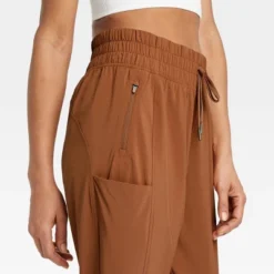 Women's Tapered Stretch Woven Mid-Rise Pants - All In Motion™ -All In Motion GUEST e7d54e55 3876 4870 a2e0 08eb0a0f7511